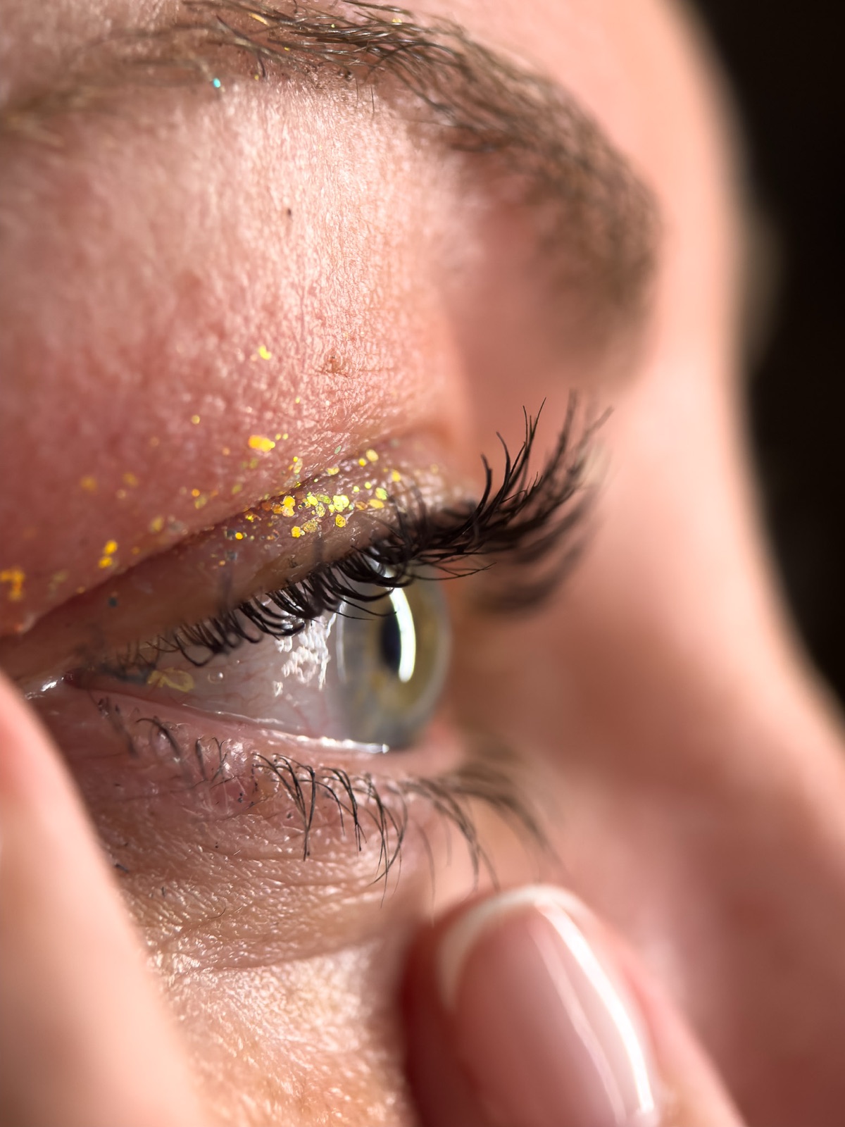 Extreme close-up of a human eye in profile
